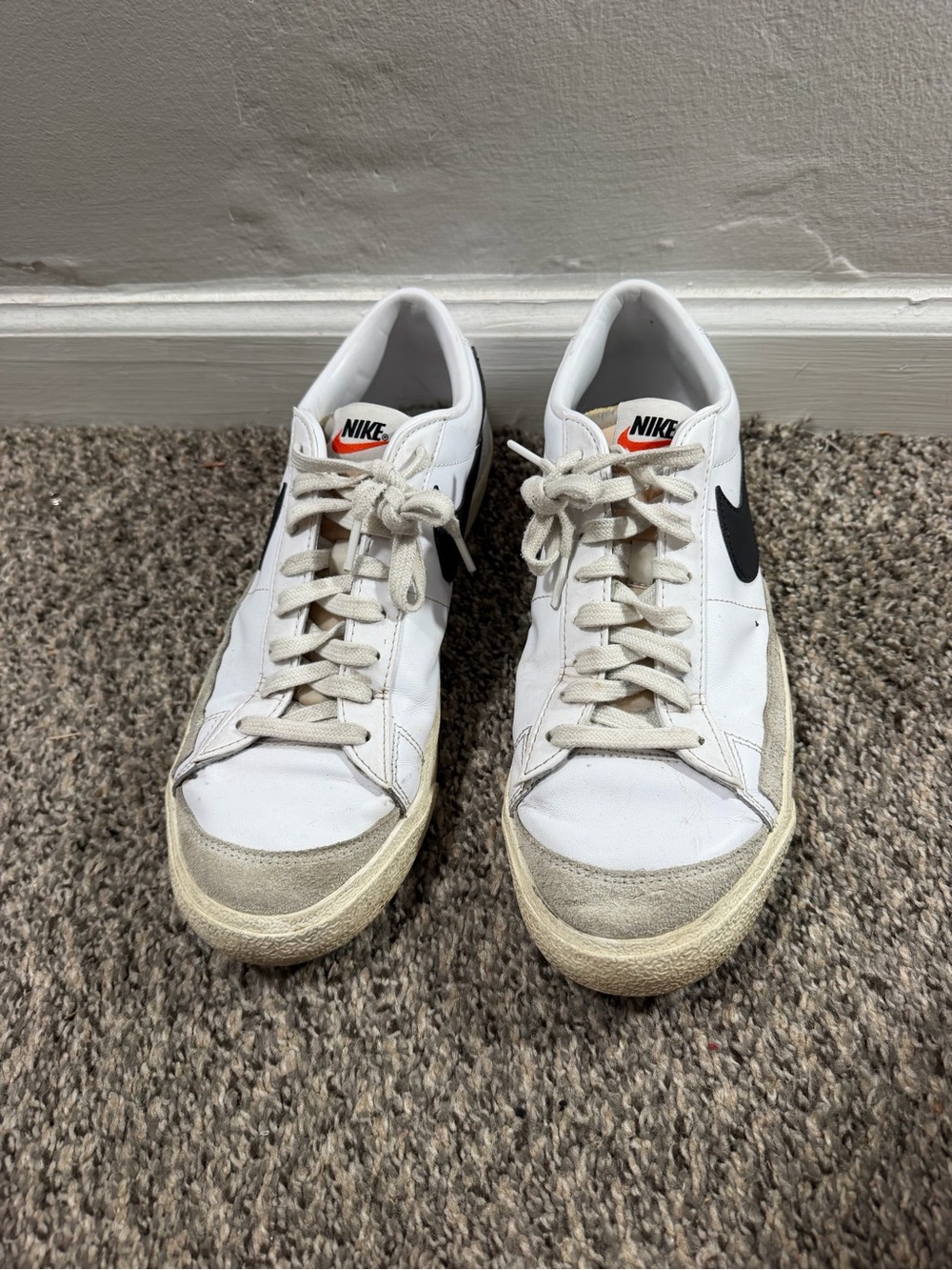 Nike White Sneakers with Black Swoosh - Low Top